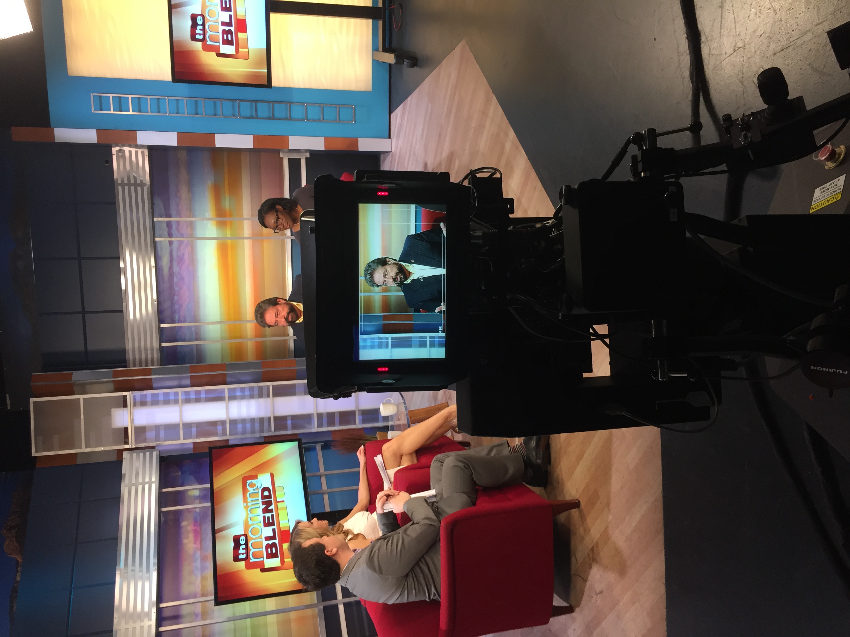 Behind-the-scenes camera monitor of Dennis Bonilla on The Morning Blend