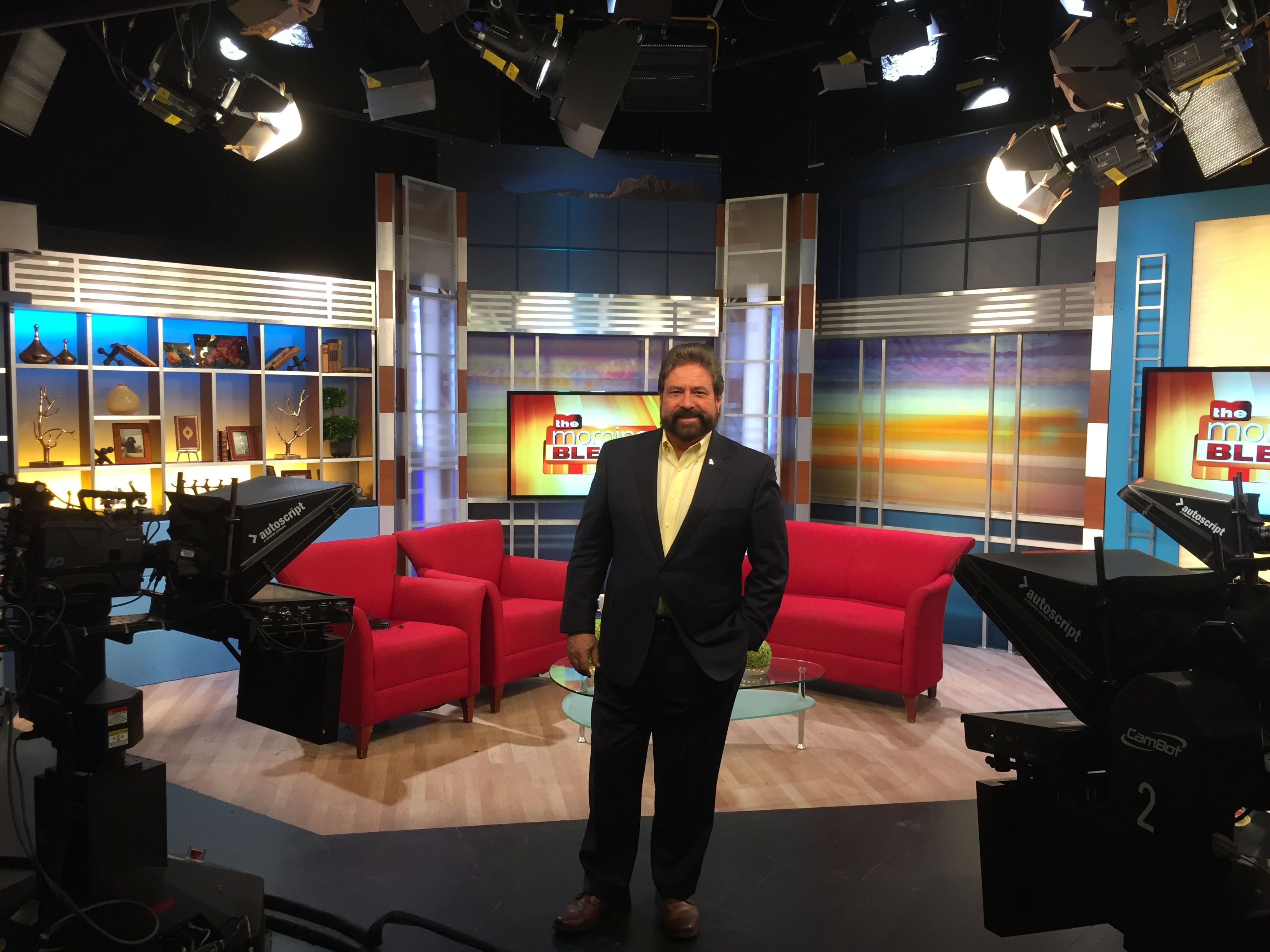 Dennis Bonilla standing on The Morning Blend television studio set