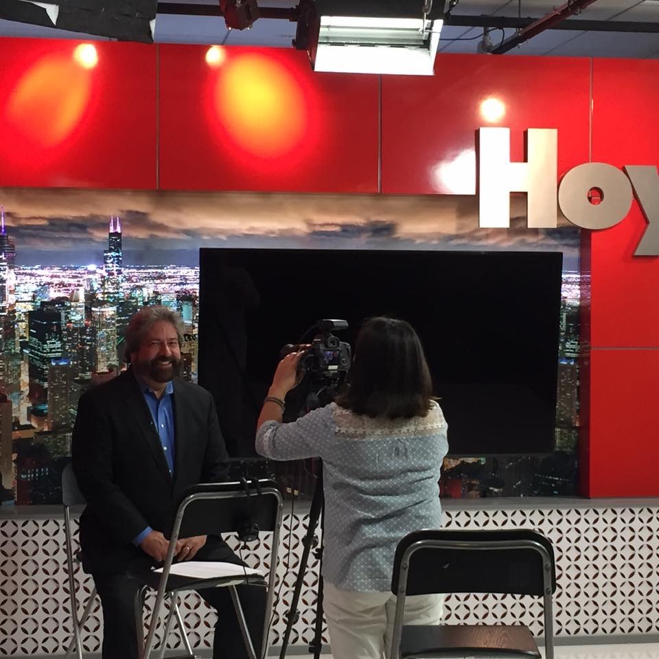Dennis Bonilla being interviewed on the Hoy television set in Chicago