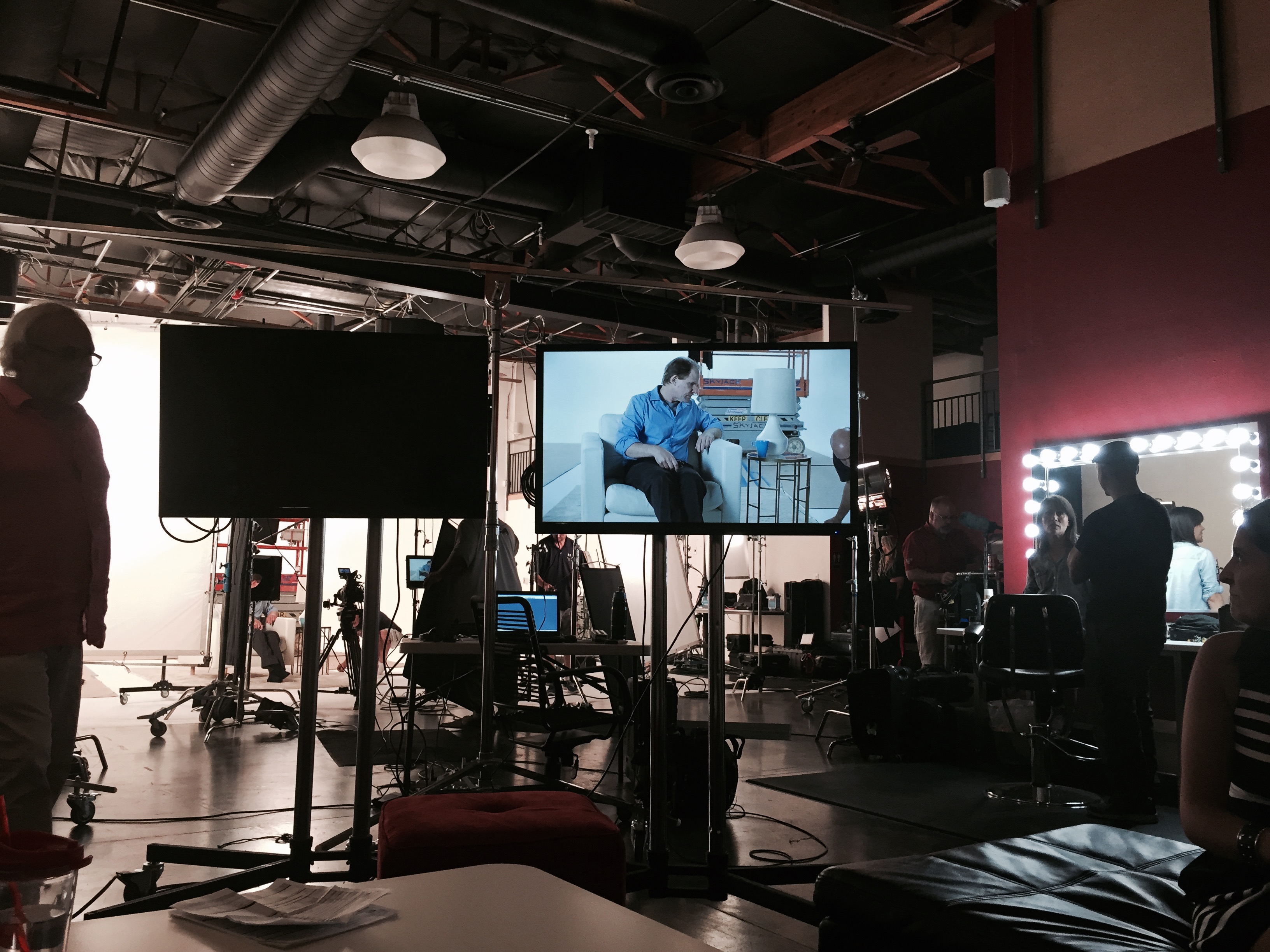 Behind-the-scenes monitor view of a documentary interview shoot