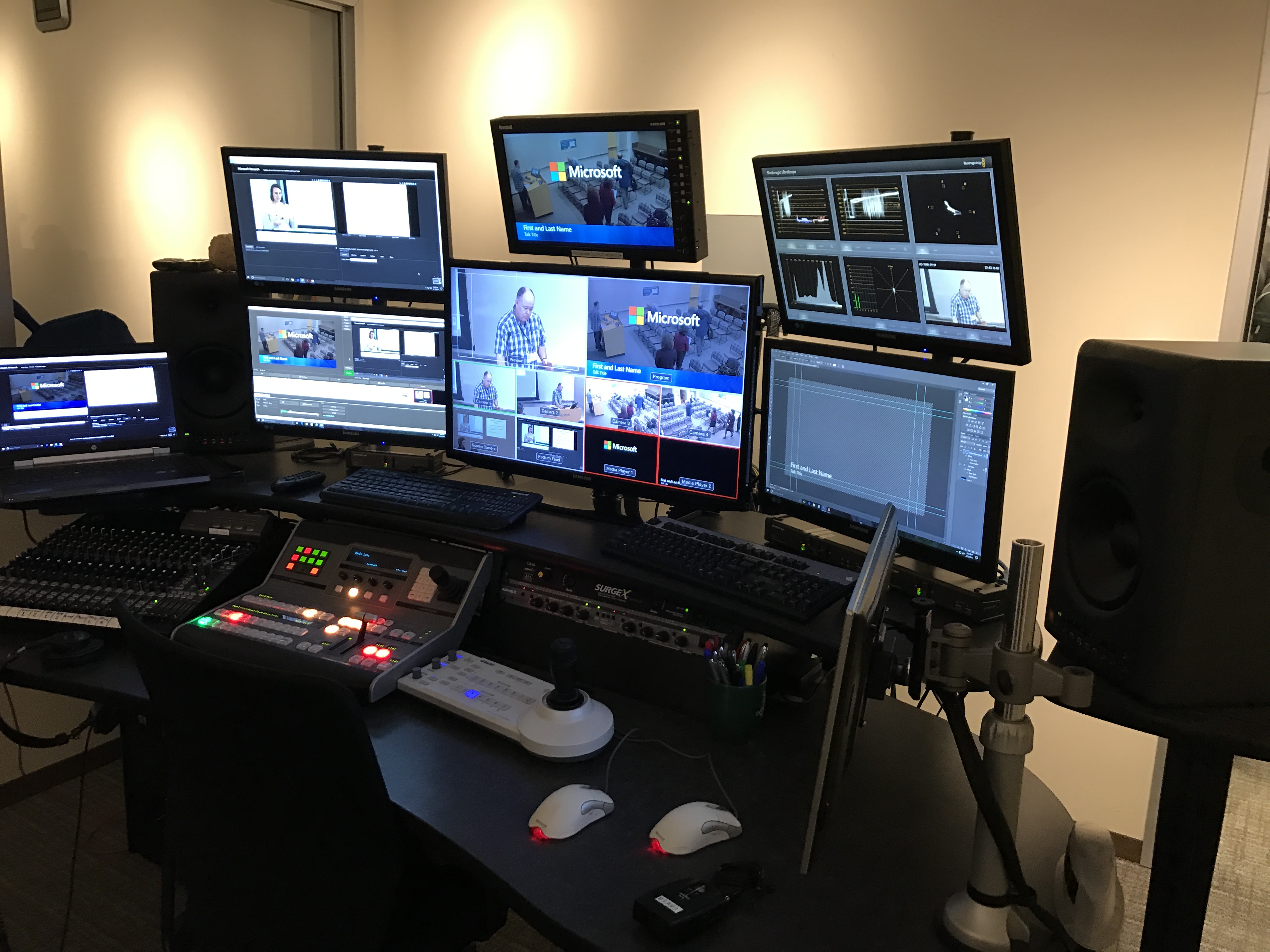 Broadcast control room with multiple monitors during a Microsoft event recording